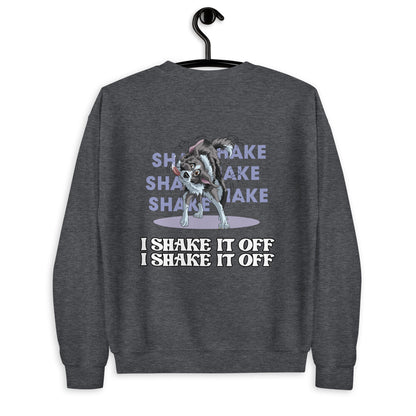 Unisex Sweatshirt "Shake it" der Marke Klexgetier. Das Sweatshirt zeigt einen verspielten Hund, der sich auf und ab bewegt, mit der Aufschrift "Shake it" in verschiedenen Schriftgrößen. Das Produkt ist auf einem einfarbigen, neutralen Hintergrund platziert.