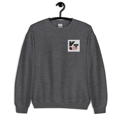 Modisches, unisex Sweatshirt "Shake it" von der Marke Klexgetier. Das dunkelgraue Oberteil zeigt ein stilvolles Logo und ist perfekt für sportliche und lässige Outfits geeignet.