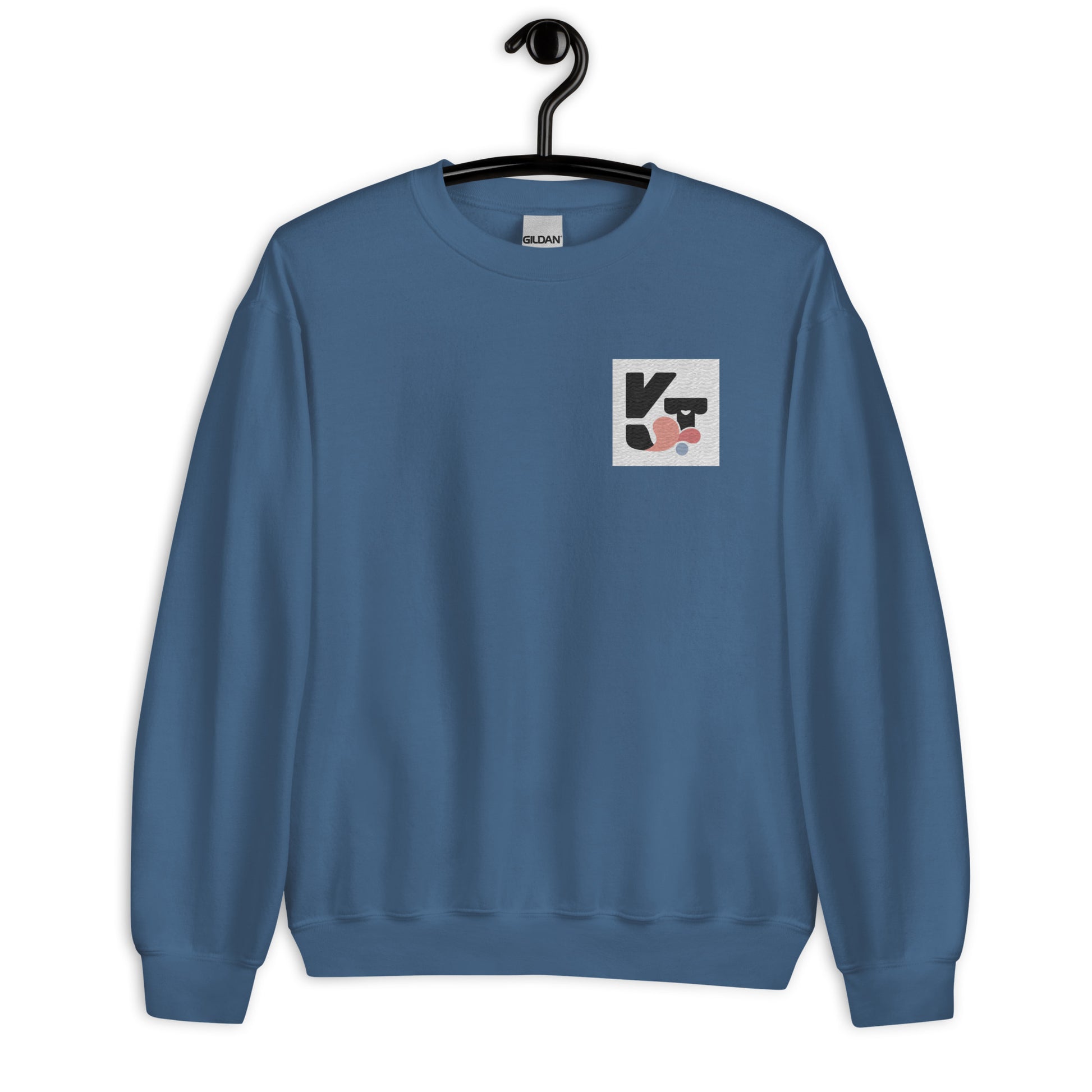 Blaues Unisex-Sweatshirt "Shake it" der Marke Klexgetier mit grafischem Logo auf der Brust, präsentiert auf einem Kleiderbügel vor einem weißen Hintergrund.