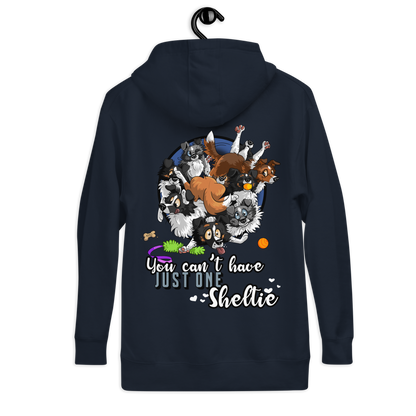 Hübscher Unisex-Kapuzenpullover "Just one Sheltie" in dunkler Farbe, auf dem eine Collage verschiedener Hunde-Rassen zu sehen ist. Der Spruch "You can't have just one Sheltie" verleiht dem Pullover einen humorvollen und liebenswerten Touch für Hundeliebhaber.