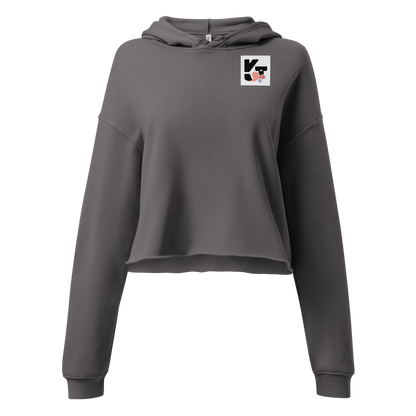 Stilvoller Crop-Hoodie "Small Things Papillons" von der Marke Klexgetier, in grauer Farbe mit einem Branding-Patch auf der Vorderseite. Der Hoodie ist ideal für Hundeliebhaber und Sportbegeisterte, die den Agility Hundesport ausüben.